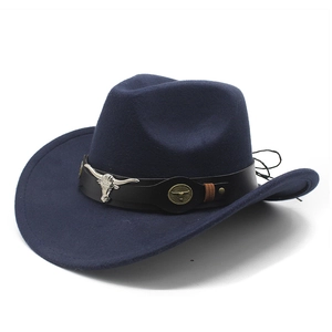 Close-up of navy blue western cowboy hat featuring a black leather band and silver bull head charm