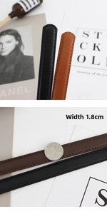 Détails de la ceinture fine en cuir de 1,8 cm comparés à une pièce de monnaie
