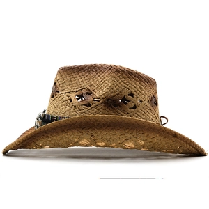 Detail view of woven cowboy hat with diamond hollow pattern and ethnic style band