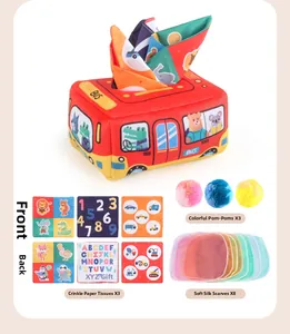 Detail of school bus tissue box toy set with plush balls and crinkle paper squares