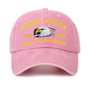 Close-up of eagle embroidery and 250th anniversary text on a pink cotton baseball cap