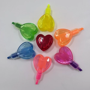 Colorful heart-shaped stackable highlighters set in circular layout on white background