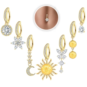 Golden belly button ring set with sun moon and butterfly designs in 14K gold plated finish