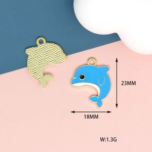 Detail of light blue enamel dolphin charm showing dimensions 18x23mm for DIY jewelry
