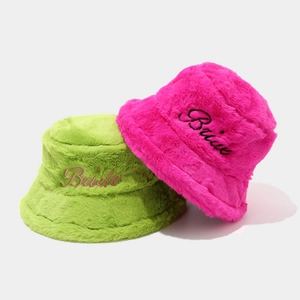 Faux fur Bride bucket hat in neon green and rose pink with elegant embroidery