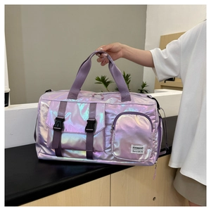 Detail of purple iridescent waterproof fitness bag with buckle and adjustable strap