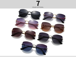 Detailed display of rimless cat eye sunglasses available in seven different lens colors
