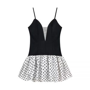 Sexy black V-neck camisole dress with white polka dot puff skirt in flat lay view