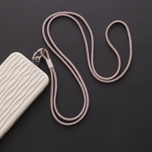 Detail of luxury pink rhinestone crossbody phone lanyard with wave-textured white case