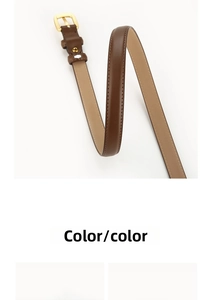 Detail of slim dark brown leather belt with gold pin buckle and fine stitching