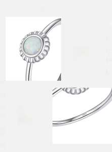 Macro detail of S925 sterling silver opal sunflower ring with radiant fire effect