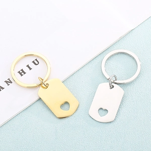 Gold and silver stainless steel keychain set with heart cutout rectangle tag pendants
