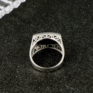 Mens stainless steel ring featuring silver hollow pattern and black zircon stone inlay