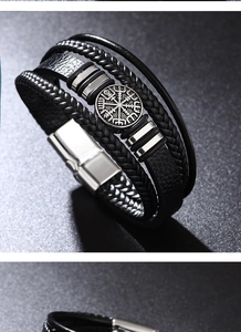Detail of multi-layer braided leather bracelet featuring a vintage compass metal charm
