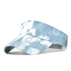 Detail of blue and white tie-dye sun hat with wide brim and cloud texture