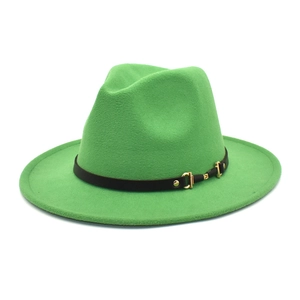 Detail of bright green wool fedora hat featuring a black leather belt with gold metal buckle