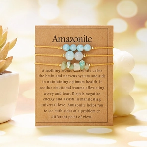 Amazonite bracelet set with round beads and irregular stones on healing properties card