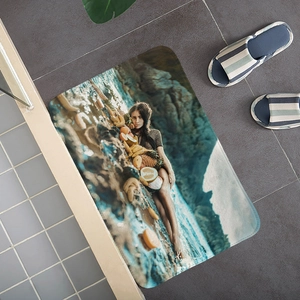 Macro detail of flannel absorbent mat featuring artistic portrait and pineapple print