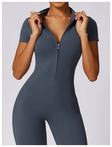 Close-up of seamless zip-front bodysuit featuring short sleeves and high-stretch fabric