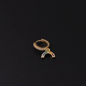 Detailed view of a gold hoop earring featuring a vibrant rainbow gemstone curved pendant