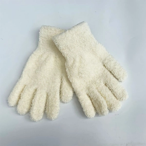 Detailed view of cream white plush knit gloves showing soft faux mink velvet texture
