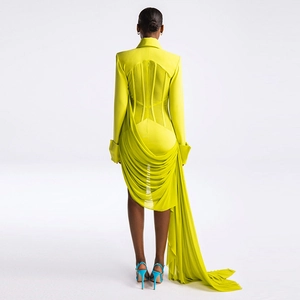 Neon green blazer dress with sheer mesh skirt and structured tailoring, back view