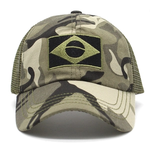 Detail of camouflage mesh baseball cap featuring breathable fabric and embroidery patch