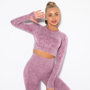 Detail of acid wash yoga set showing seamless knit texture and thumbhole cuffs