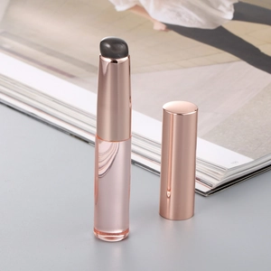 Flacone roll-on in vetro oro rosa e trasparente per profumi con sfera nera inclusa