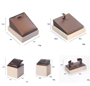 Detailed size and weight dimensions for various brushed leather jewelry display stands