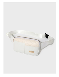 Close-up of white quilted waist bag featuring golden zippers and adjustable black buckle