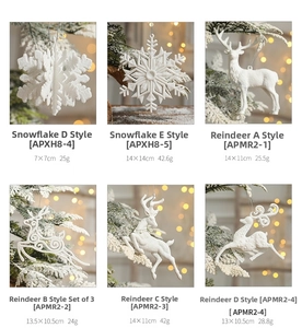 Detailed views of white glitter snowflake and reindeer Christmas tree ornaments with sizes