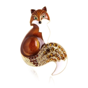 Vintage fox brooch with warm enamel finish and sparkling amber crystals on gold metal