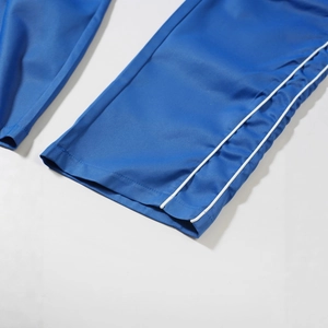 Blue American retro straight-leg sports pants with white side stripes detail