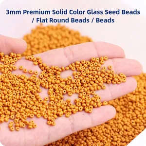 3mm solid orange-yellow glass seed beads in a round flat shape for DIY jewelry making