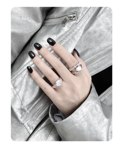 Detail of S925 silver twist rope ring featuring a white Baroque pearl on model