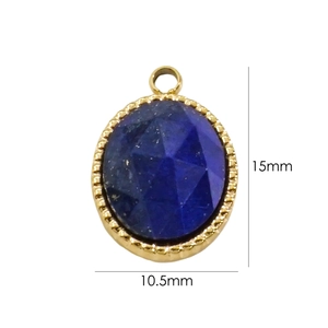 Macro detail of oval blue gemstone pendant in gold-plated frame with 15x10.5mm size guide