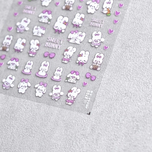 Détail d'autocollants gaufrés Sweet Bunny avec lapins blancs et nœuds violets