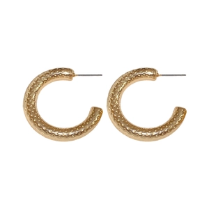 Textured gold-plated C-shaped hoop earrings with a minimalist hammered metal finish