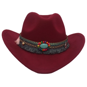 Detail of burgundy wool cowboy hat with ethnic beaded band and turquoise stone accents