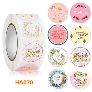 Detailed views of 8 floral Thank You roll sticker designs for gift packaging seal