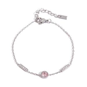 Detailed view of silver chain bracelet with pink gemstone and zircon-studded metal bars