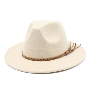 Detail of beige wool fedora hat featuring a brown braided decorative band on white background