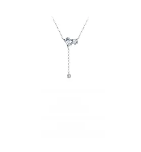 Macro detail of S925 sterling silver Y-shaped necklace with emerald cut emerald pendant