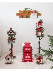 Detailed view of wooden Santa mailbox and birdhouse ornaments with festive LED lights