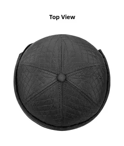 Top view of men's black quilted beanie with diamond stitching and center button detail