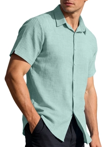 Close-up of mint green short-sleeve shirt showing breathable fabric texture and collar