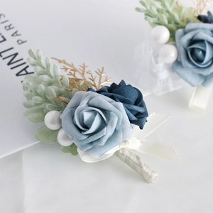 Blue artificial rose wedding boutonniere set with pearls and white ribbon detail
