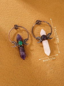 Detailed view of crystal pendants with bronze moon carvings showing 7.35cm dimensions