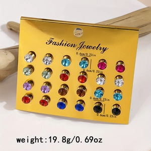 Detail view of 12 pairs of sparkling crystal stud earrings in various vibrant colors